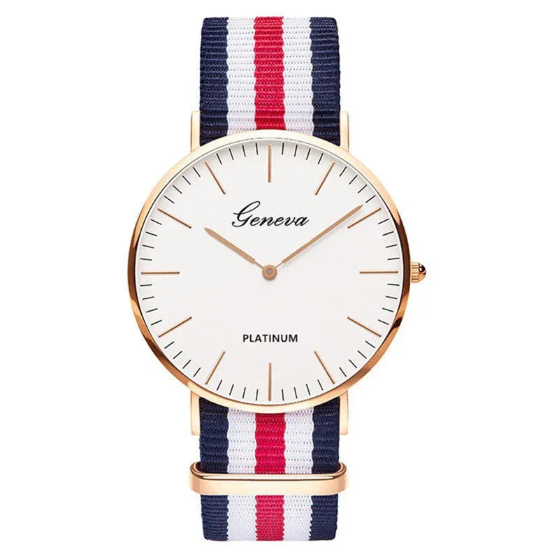 Geneva Platinum watch with a minimalist white dial and a striped navy, white, red fabric strap