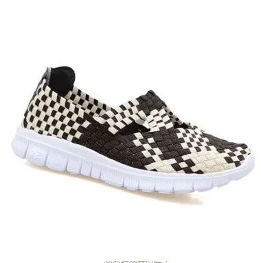 Black and white checkered woven slip-on sneaker with white cushioned sole