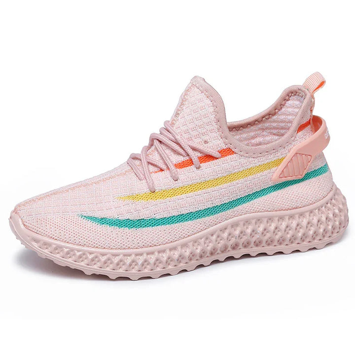 Light pink breathable knit sneaker with colorful yellow, orange, and teal stripes and textured sole