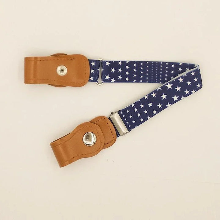 Navy blue guitar strap with white stars pattern and brown leather ends with metal snaps