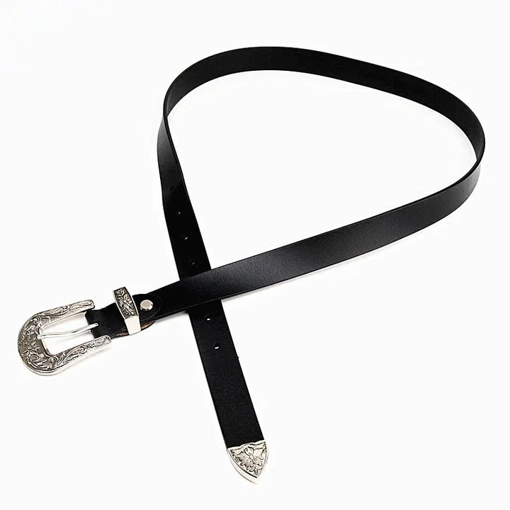 black leather belt with ornate silver buckle and tip on white background