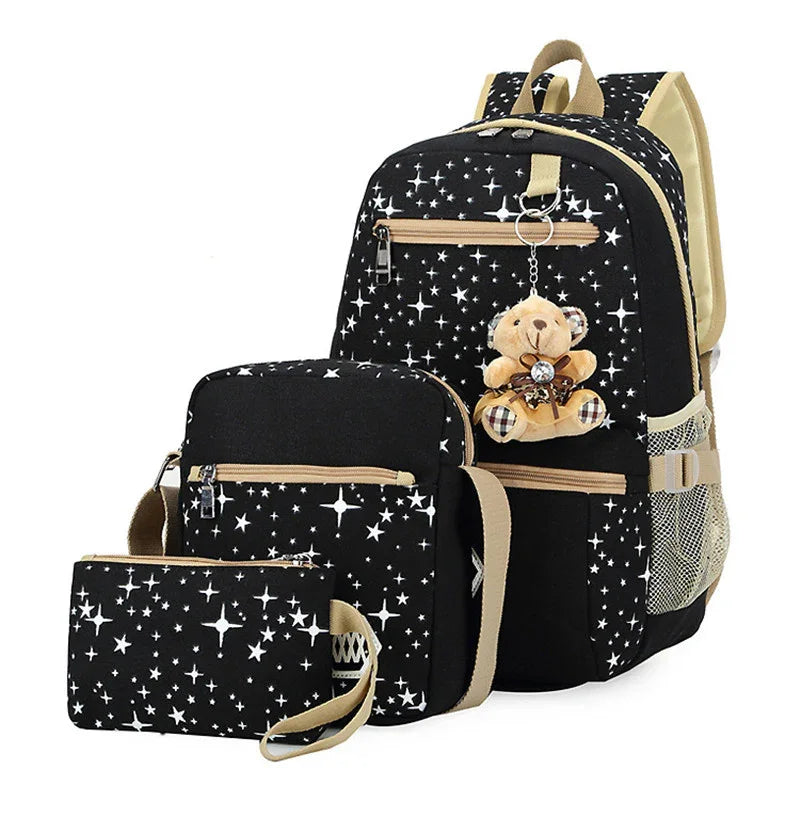 Black backpack, shoulder bag, and pouch set with white star pattern and teddy bear keychain
