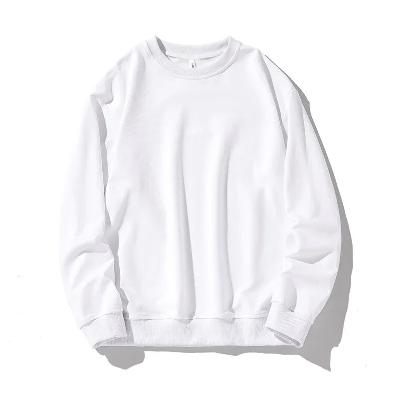 White crewneck sweatshirt with long sleeves and ribbed cuffs, displayed on white background