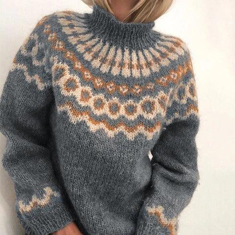 Cozy gray wool sweater with intricate peach and white Icelandic yoke pattern and ribbed collar