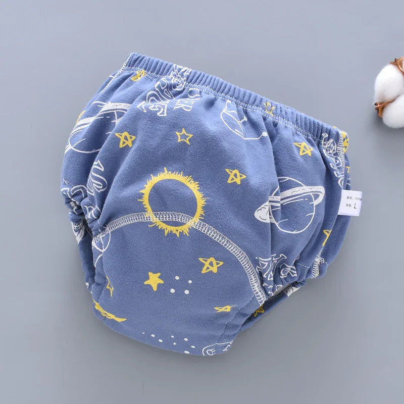 Blue baby diaper cover with yellow stars and white planet and sun space-themed pattern