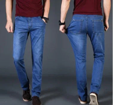 Man wearing slim fit blue denim jeans and maroon shirt, front and back view on gray background