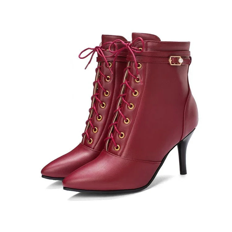 Elegant red leather lace-up ankle boots with gold eyelets, pointed toes, and stiletto heels