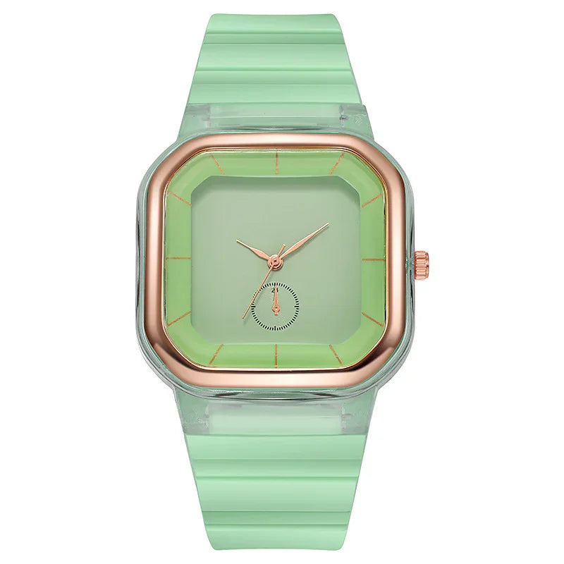 Square green wristwatch with rose gold bezel and matching green silicone strap