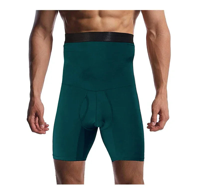 Male model wearing high-waist dark green slimming compression shorts with black waistband