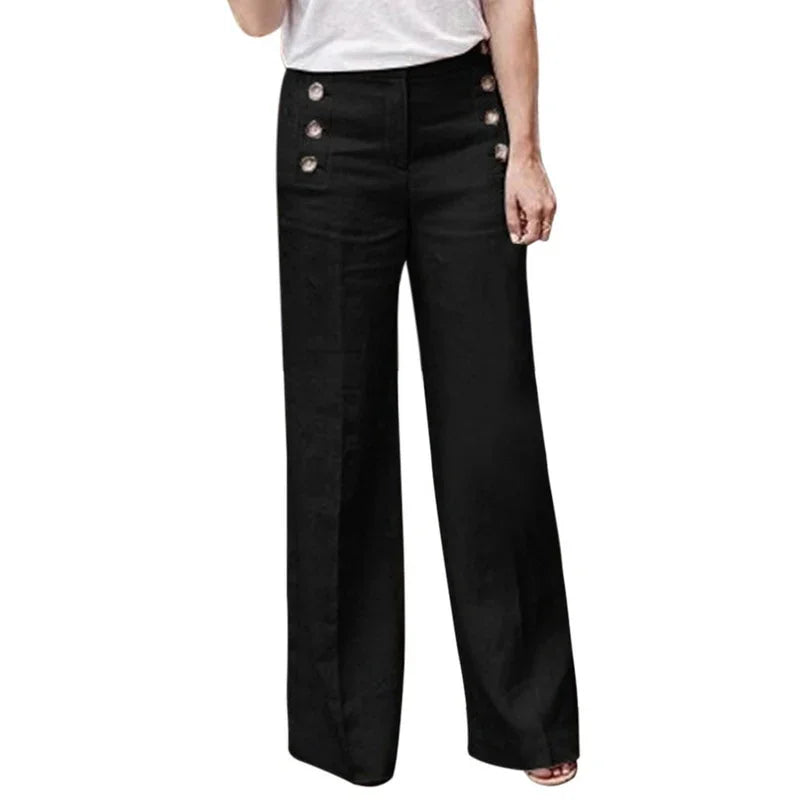 Women’s black high-waisted wide leg pants with decorative gold buttons, paired with white top