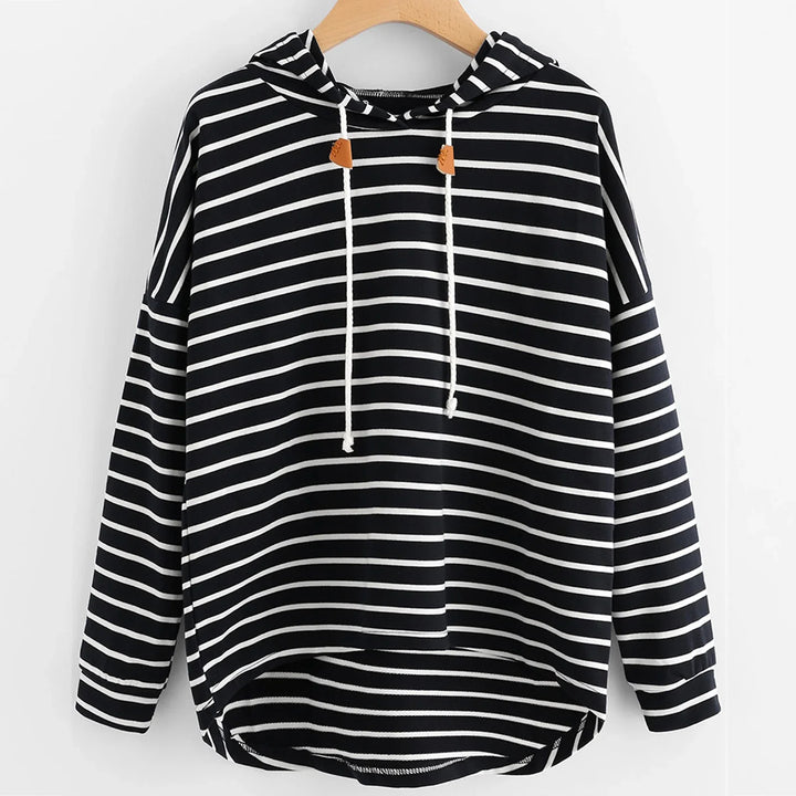 Black and white horizontal striped hoodie with drawstrings on wooden hanger