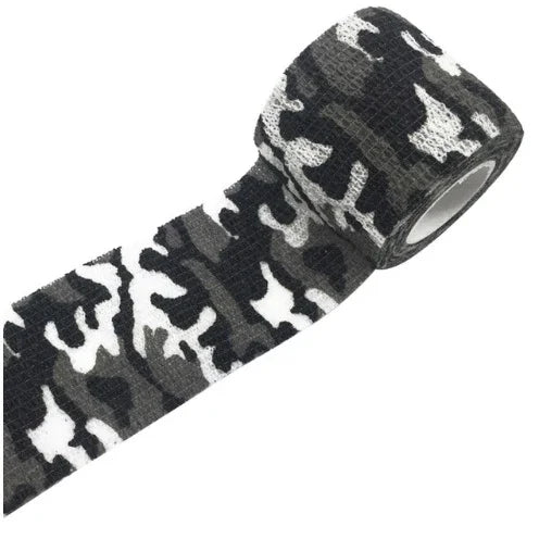 Black and white camouflage cohesive bandage roll on white background