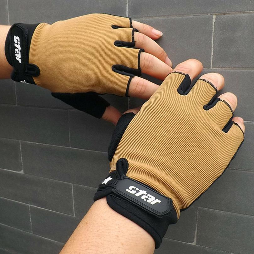 Tan and black fingerless workout gloves with star logo, worn by person against gray tile wall