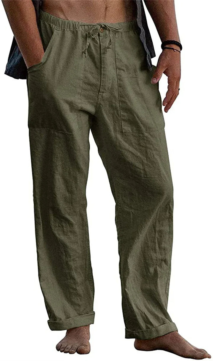 Men's casual olive green linen pants with elastic waistband and drawstring, relaxed fit, barefoot