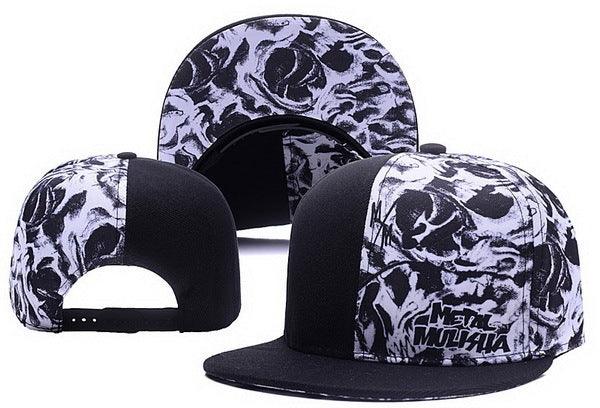 Black and white snapback caps featuring skull designs and Metal Mulisha logo on front panel