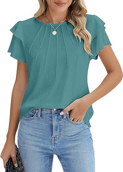 Woman wearing teal short-sleeve pleated blouse with ruffle sleeves and light blue jeans