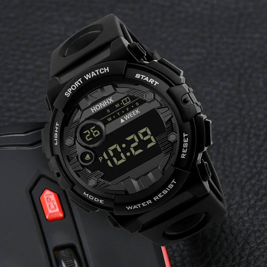 Black digital sport watch with rubber strap displaying time 10:29, water resistant and multi-function buttons