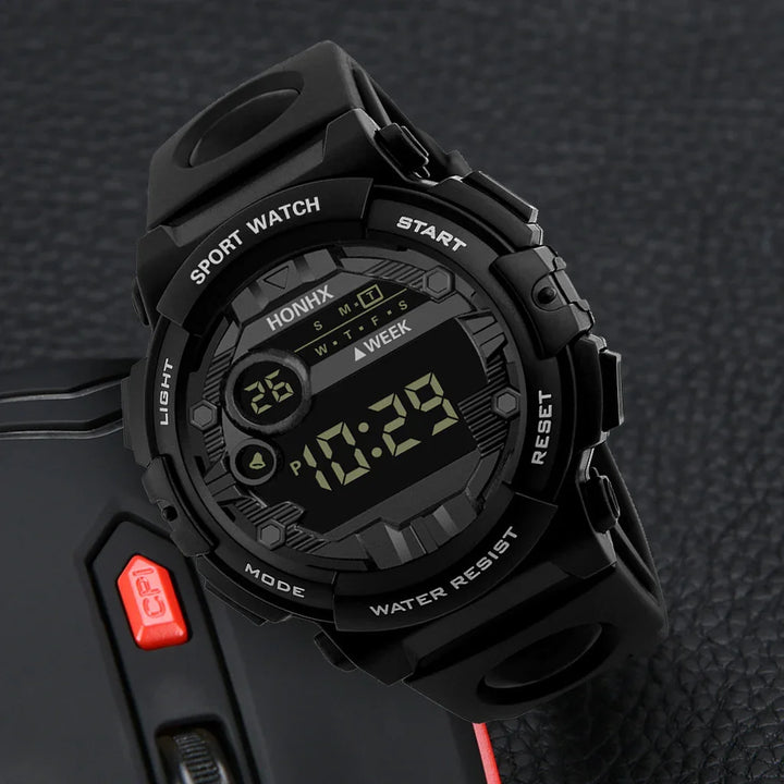 Black digital sport watch with rubber strap displaying time 10:29, water resistant and multi-function buttons