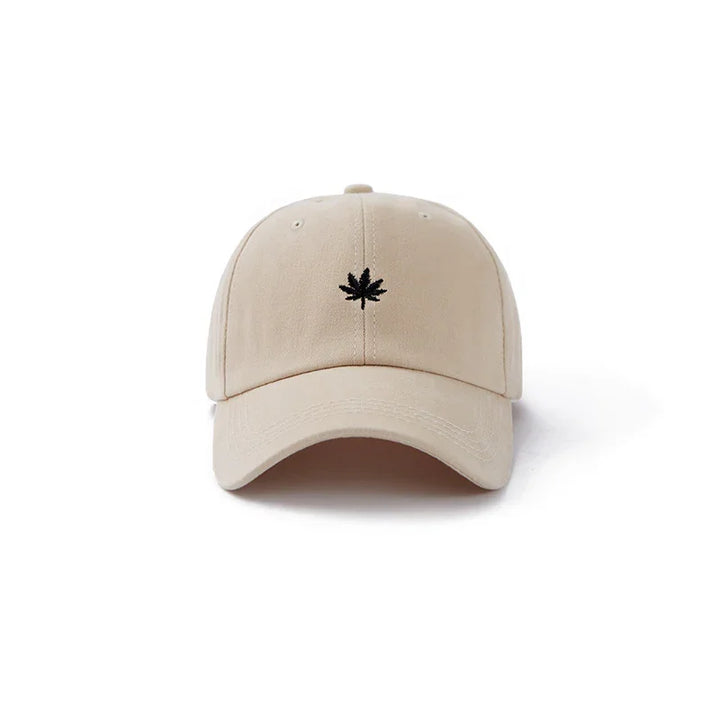 Beige baseball cap with black embroidered leaf logo on front panel