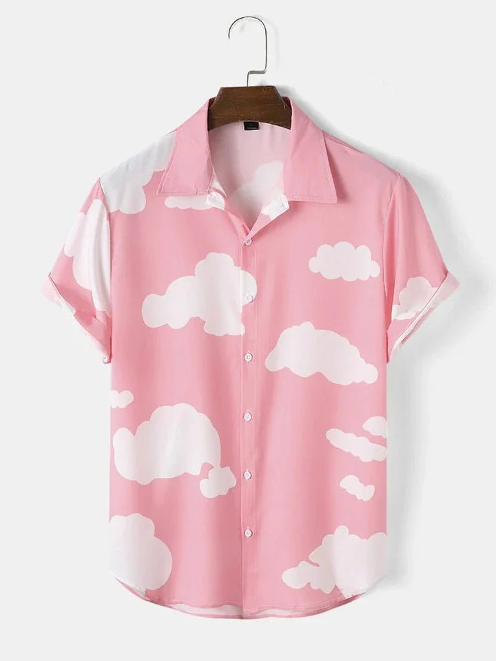 Pink short-sleeve button-up shirt with white cloud pattern on wooden hanger