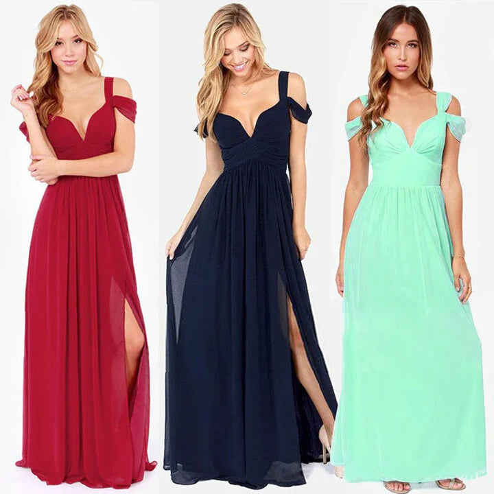 Three women wearing elegant off-shoulder maxi dresses in red, navy blue, and mint green with thigh slits