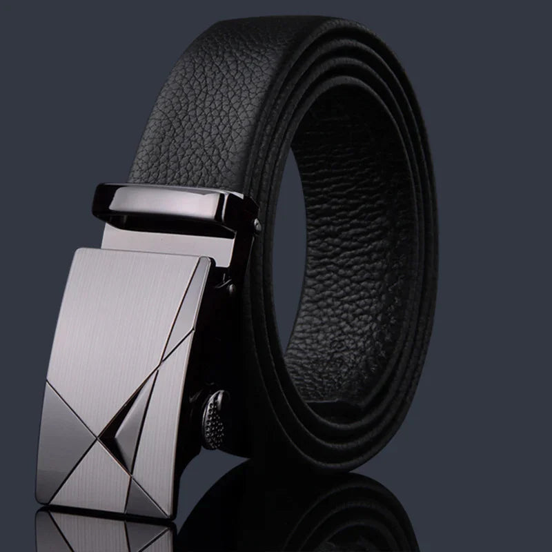 Black leather belt with textured surface and modern silver geometric buckle on dark background