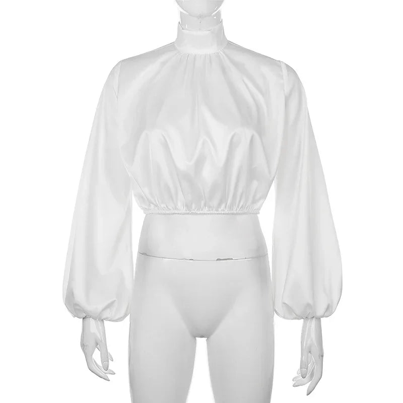 White satin long sleeve crop top with high neck and elastic waist on mannequin