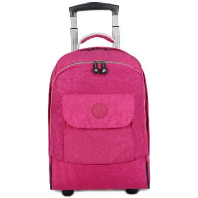Pink wheeled trolley backpack with front pocket and retractable handle on white background