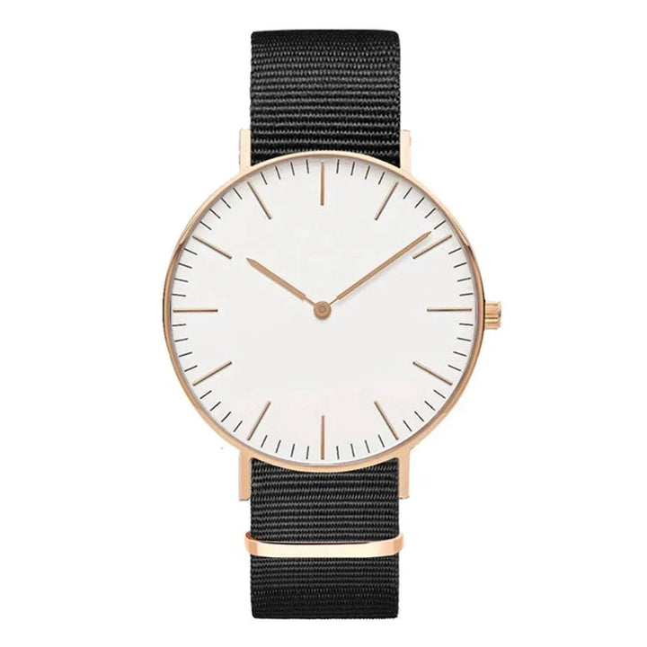 Minimalist wristwatch with white dial, rose gold case, gold hands, and black nylon strap