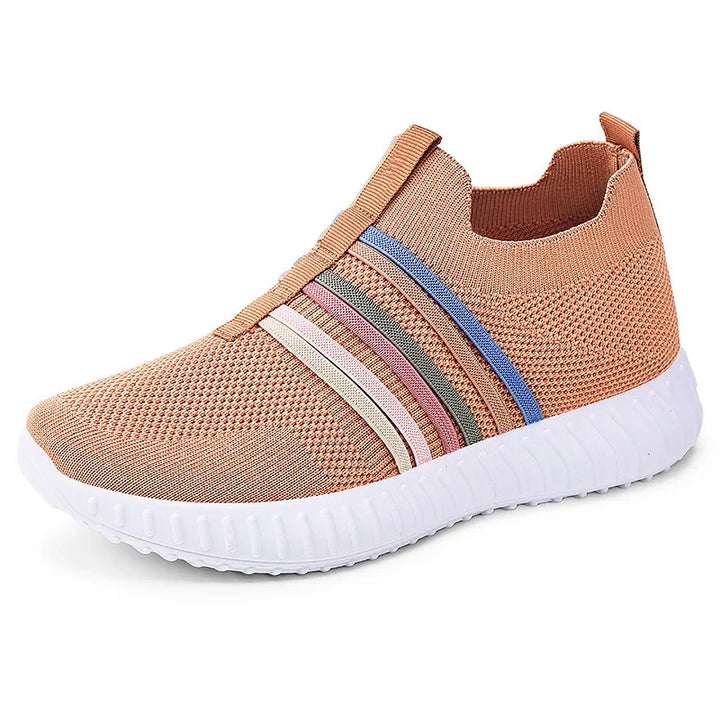 Light brown knit slip-on sneaker with multicolor stripes and white textured sole