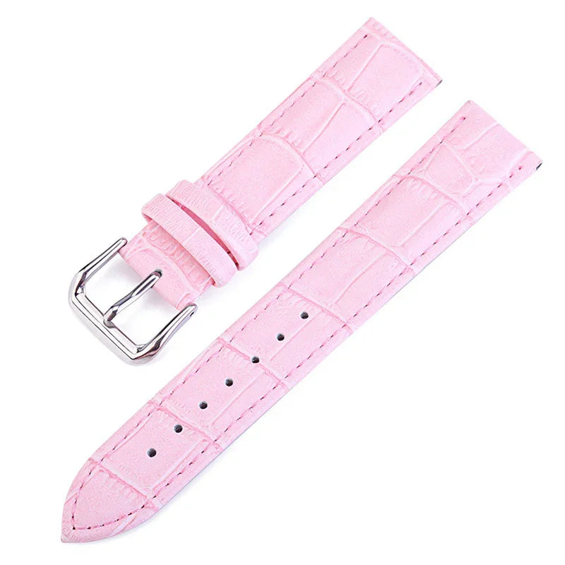 Pink leather watch strap with crocodile texture and silver buckle