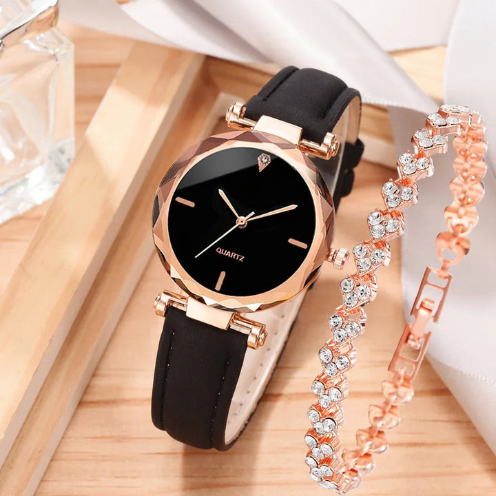 Elegant women's quartz watch with black leather strap and rose gold bezel next to a sparkling crystal bracelet