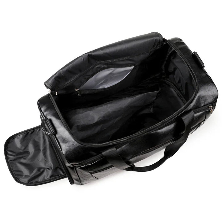 Open black leather duffel bag with zippered compartment and carrying handles