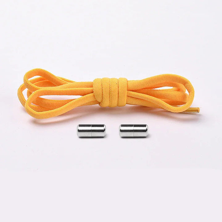 Yellow elastic shoelace with two silver metal aglets on a white background