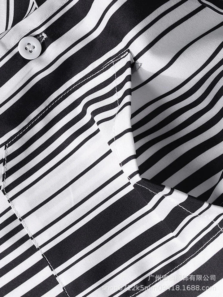 Close-up of black and white striped fabric with stitched pocket and white button on garment