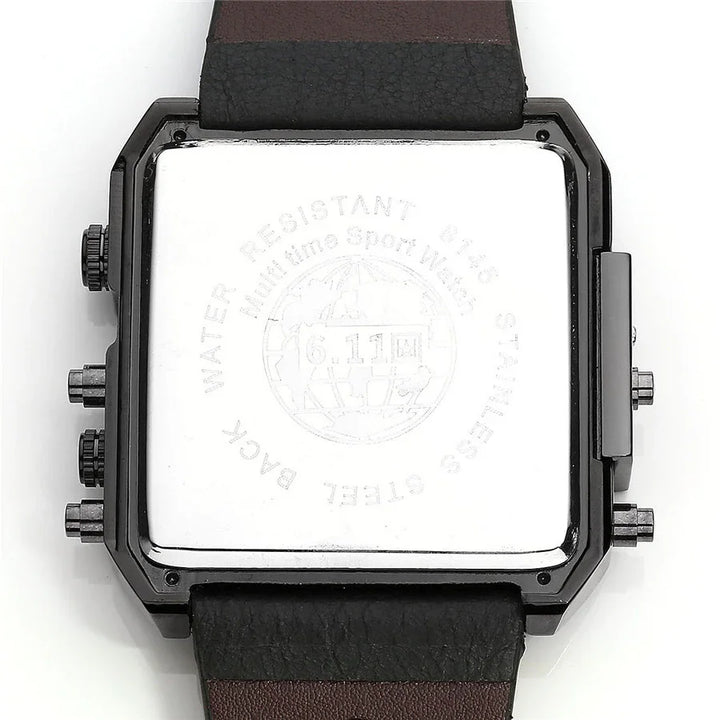 Back of a square multi-time sport watch with stainless steel case and black and brown leather strap
