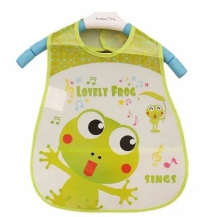 Yellow baby bib with green frog and text 'Lovely Frog Sings' surrounded by musical notes