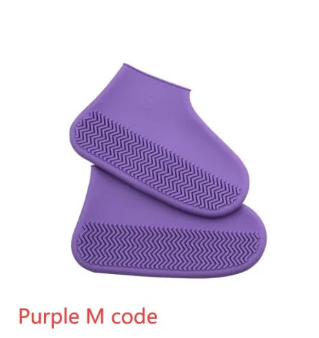 Pair of purple silicone shoe covers with textured soles for outdoor protection