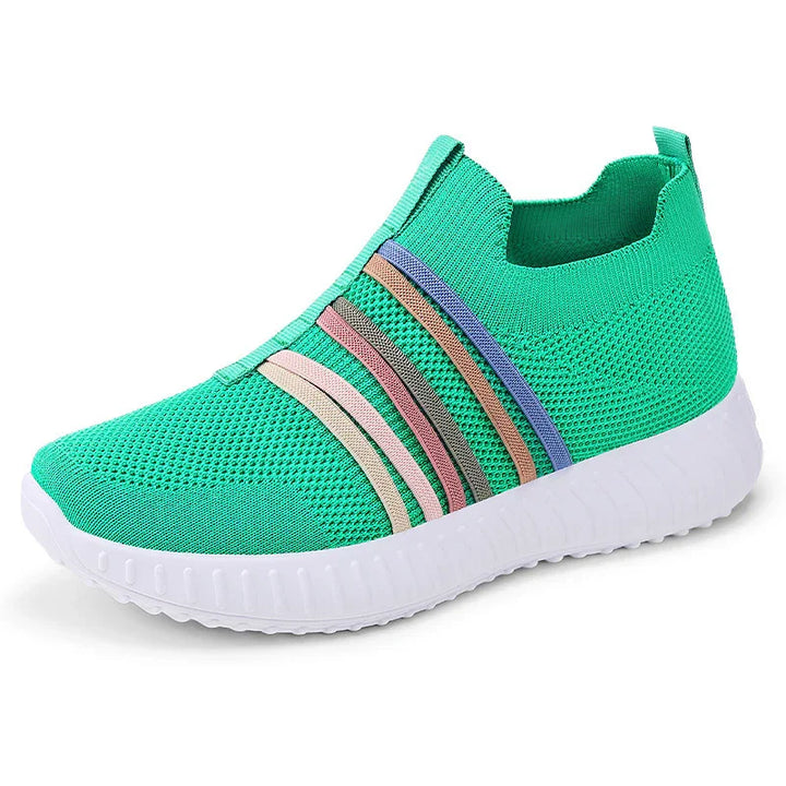 Green knit slip-on sneaker with multicolor stripes and white rubber sole