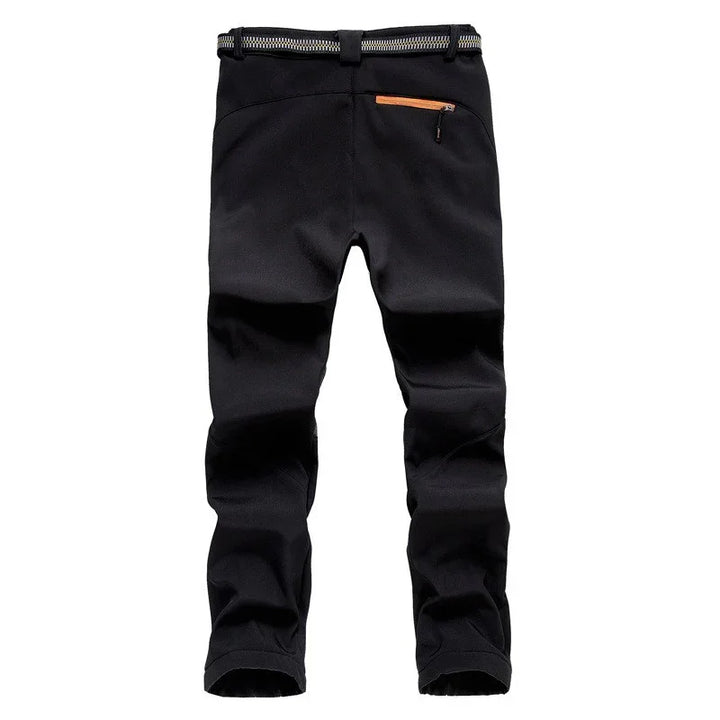 Black outdoor hiking pants with orange zipper pocket and black belt