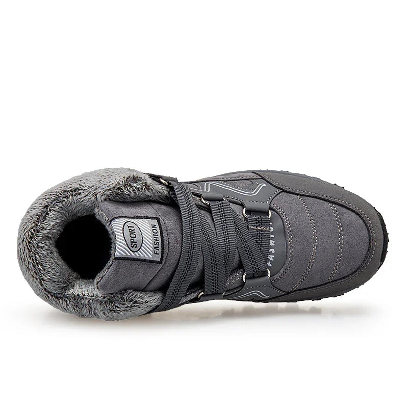 Gray winter sport sneaker with faux fur lining and black laces, labeled Sport Fashion