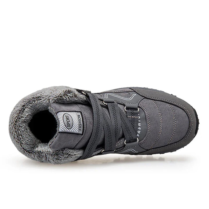 Gray winter sport sneaker with faux fur lining and black laces, labeled Sport Fashion
