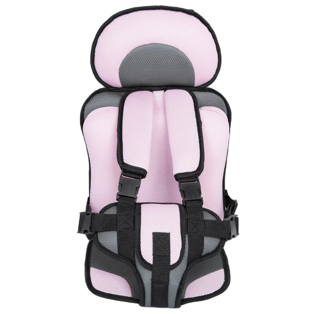 Pink and gray padded child safety car seat harness with adjustable straps and buckle