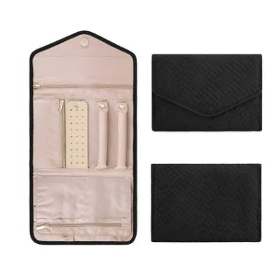 Black travel jewelry organizer with quilted texture, shown closed and open with multiple compartments