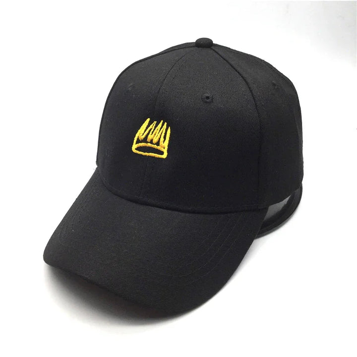 Black baseball cap with yellow embroidered crown logo on front, curved brim, and adjustable back strap