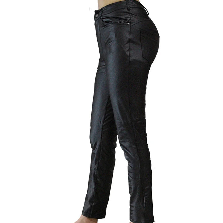 Side view of slim fit black satin pants with high waist and front pockets