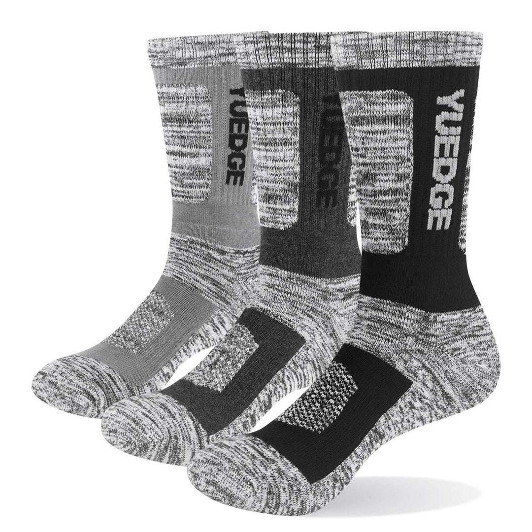Three pairs of cushioned crew socks in gray, charcoal, and black with YUEDGE branding and padded soles