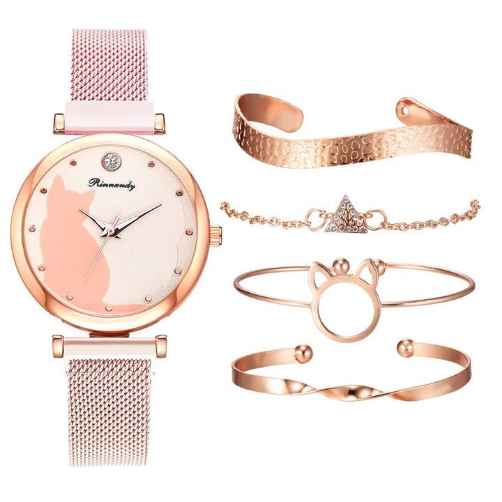 Rose gold watch with cat silhouette and matching textured and shaped bracelets on white background