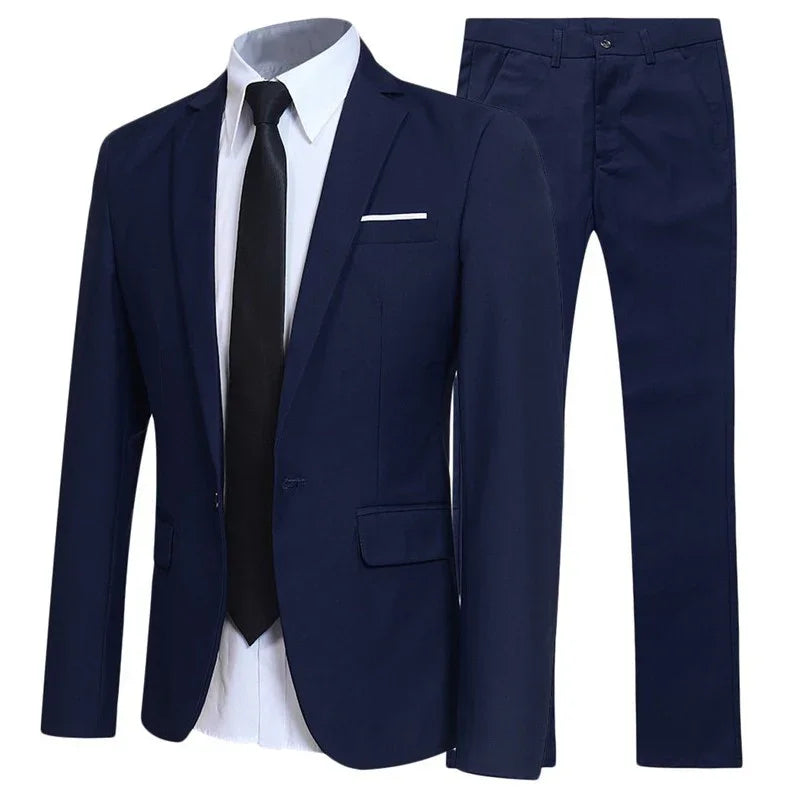 Men's navy blue slim fit suit with jacket, white dress shirt, black tie, and matching trousers