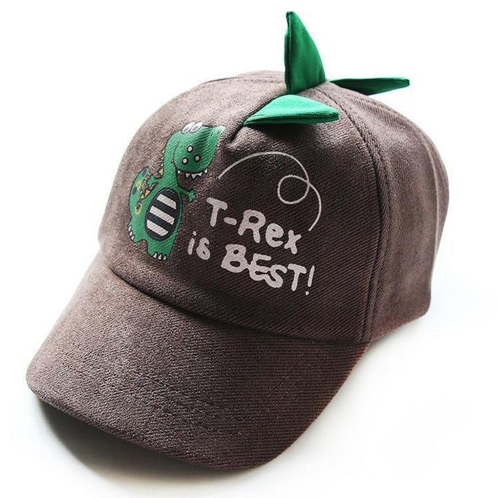 Brown kids baseball cap with green dinosaur print and text T-Rex is BEST, featuring green fabric spikes